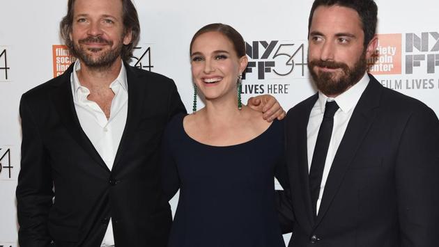 Natalie Portman and Peter Sarsgaard pose with director Pablo Larrain attend the 54th New York Film Festival Jackie screening. (AFP)