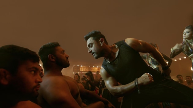 Aamir Khan in a poster for his rap version of the song Dhaakad from Dangal. Aamir Khan in a poster for his rap version of the song Dhaakad from Dangal.