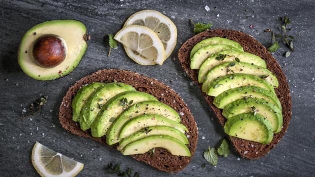 Avocado: It is a fruit that is rich in proteins and Omega-9 fatty acids which are building blocks of healthy complexion and help the skin fight winter dryness from inside. It helps in retaining a soft and glowing skin. Vitamin E in avocado prevents wrinkling while the fruit oil can be used as a natural moisturiser. (Shutterstock) Avocado: It is a fruit that is rich in proteins and Omega-9 fatty acids which are building blocks of healthy complexion and help the skin fight winter dryness from inside. It helps in retaining a soft and glowing skin. Vitamin E in avocado prevents wrinkling while the fruit oil can be used as a natural moisturiser. (Shutterstock)