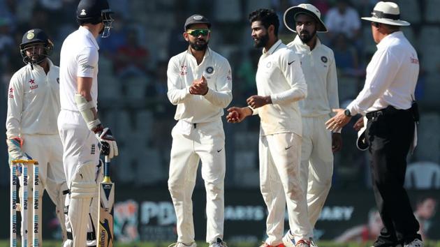 Virat Kohli plays peacemaker as Ravindra Jadeja confronts England’s James Anderson on Day 5 of the fourth India vs England cricket Test at Mumbai’s Wankhede Stadium on Monday.(BCCI)