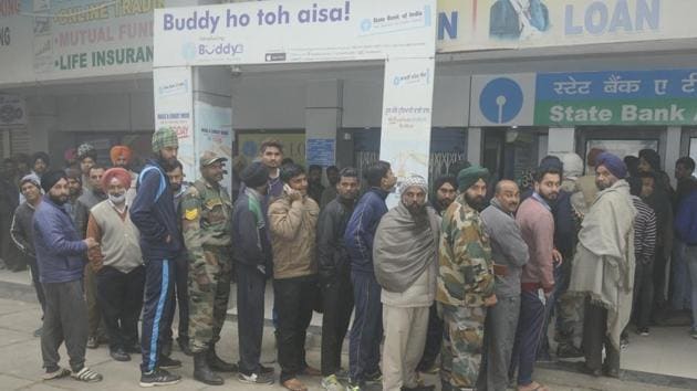 People in a queue outside an ATM in Patiala on December 8.