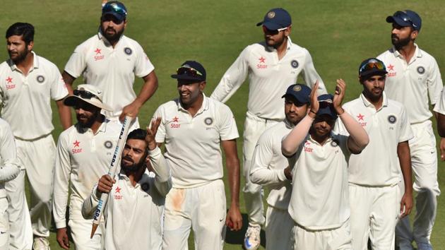 India players, led by skipper Virat Kohli, celebrate after completing an innings and 36 runs win over England.(Pratham Gokhale/HT PHOTO)