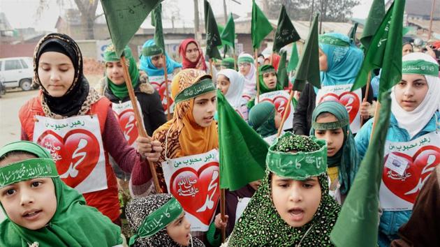 Girls holding Islamic flags and shouting religious slogans while taking part in an Eid-e-Milaad-un-Nabi in Srinagar. (PTI Photo) Girls holding Islamic flags and shouting religious slogans while taking part in an Eid-e-Milaad-un-Nabi in Srinagar. (PTI Photo)