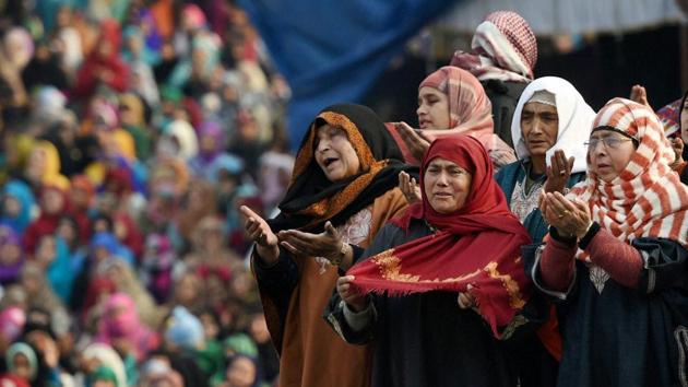 Female devotees pray upon seeing a relic believed to be a hair from the beard of Prophet Mohammad at the Hazratbal Shrine in Srinagar during Eid-e-Milad-un-Nabi. (S Irfan / PTI ) Female devotees pray upon seeing a relic believed to be a hair from the beard of Prophet Mohammad at the Hazratbal Shrine in Srinagar during Eid-e-Milad-un-Nabi. (S Irfan / PTI )