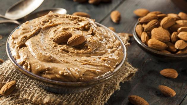 Nut Butter: It is a healthy source of fat but it digests slowly and may remain present in your stomach all night if consumed in large quantities, leading to disturbed sleep. So keep high fat food (nuts, cheese, cream sauces) consumption relatively low at night. (Shutterstock) Nut Butter: It is a healthy source of fat but it digests slowly and may remain present in your stomach all night if consumed in large quantities, leading to disturbed sleep. So keep high fat food (nuts, cheese, cream sauces) consumption relatively low at night. (Shutterstock)