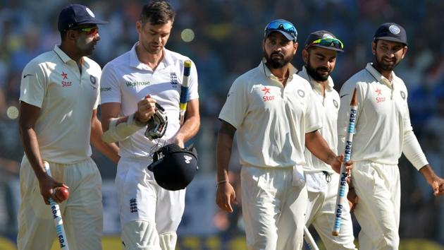 Ravichandran Ashwin (left) speaks with England's James Anderson (2nd Left) as India's Murali Vijay (Centre), captain Virat Kohli (2nd R) and Cheteshwar Pujara (R) watch after India won the fourth Test cricket match against England at the Wankhede Stadium in Mumbai on December 12. (AFP) Ravichandran Ashwin (left) speaks with England's James Anderson (2nd Left) as India's Murali Vijay (Centre), captain Virat Kohli (2nd R) and Cheteshwar Pujara (R) watch after India won the fourth Test cricket match against England at the Wankhede Stadium in Mumbai on December 12. (AFP)