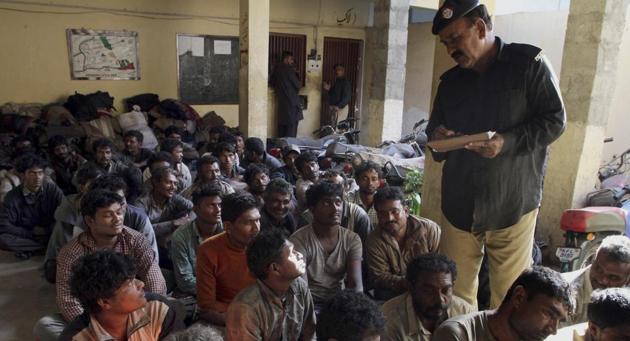 File photo: A Pakistani police officer collects information from arrested Indian fishermen at a police station in Karachi, Pakistan, Sunday, Nov. 20, 2016.(AP)
