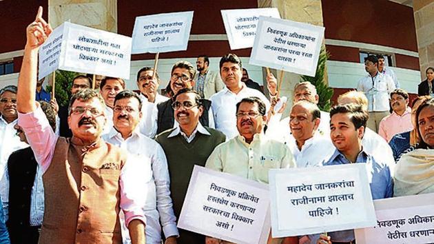 Congress and NCP MLAs demand Mahadev Jankar’s resignation, outside Vidhan Bhavan in Nagpur on Tuesday. (Sunny Shende) Congress and NCP MLAs demand Mahadev Jankar’s resignation, outside Vidhan Bhavan in Nagpur on Tuesday. (Sunny Shende)