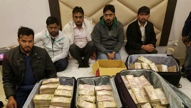 Rs 3.25 crore in old notes were seized after a raid at a hotel in Karol Bagh in Delhi. (Photo: Delhi Police) Rs 3.25 crore in old notes were seized after a raid at a hotel in Karol Bagh in Delhi. (Photo: Delhi Police)