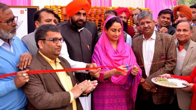 Union Minister for food processing industry Harsimrat Kaur Badal cutting the ribbon at the foundation stone-laying ceremony in Bathinda on Tuesday. (HT PHOTO) Union Minister for food processing industry Harsimrat Kaur Badal cutting the ribbon at the foundation stone-laying ceremony in Bathinda on Tuesday. (HT PHOTO)