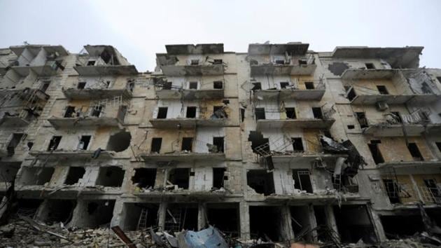 Damaged buildings are seen in the government-held al-Shaar neighborhood of Aleppo, during a media tour, Syria on December 13. (Reuters) Damaged buildings are seen in the government-held al-Shaar neighborhood of Aleppo, during a media tour, Syria on December 13. (Reuters)