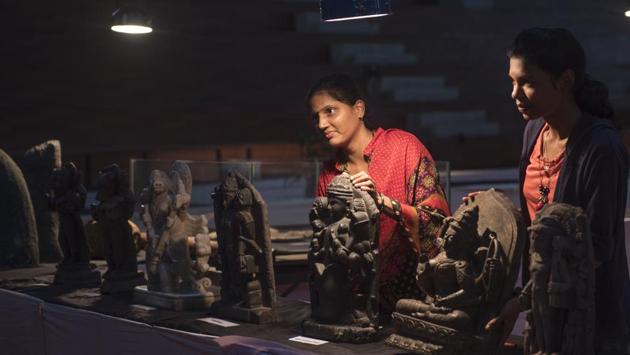 Bringing facts to light: People put the artefacts in order. (SATISH BATE/HT PHOTO) 
