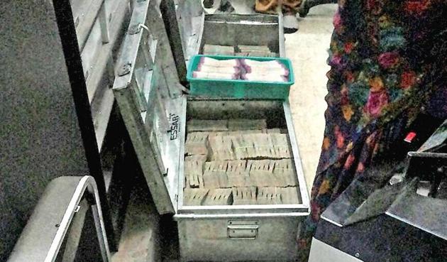 The cash recovered by the income-tax department from a bank locker in Pune on Wednesday.(PTI)