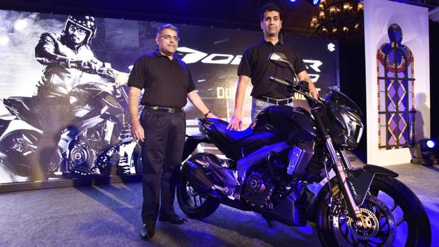 Bajaj Auto managing director Rajiv Bajaj (R) with Motocycles Business President Eric Vas at the product launch in New Delhi. (Sanjeev Verma/HT PHOTO)