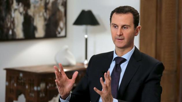 Syrian president Bashar al-Assad speaks during an interview with AFP in the capital Damascus in February 2016.(AFP)