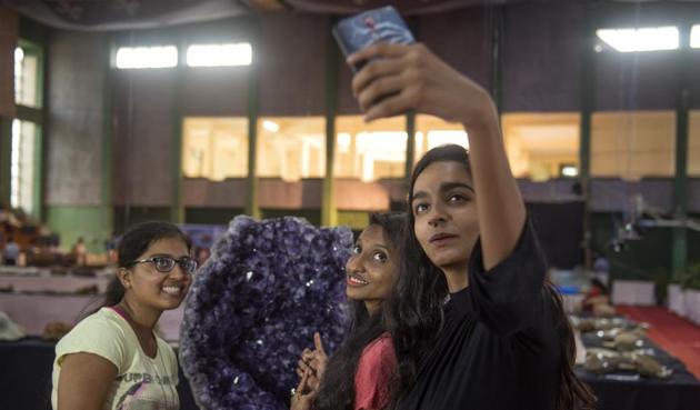Some take a quick selfie at the Kalina University in Mumbai. (Satish Bate/HT)
