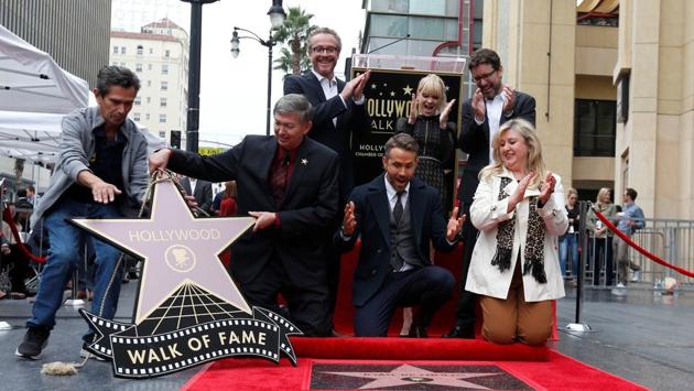 Reynolds reacts as his star is unveiled. (REUTERS)
