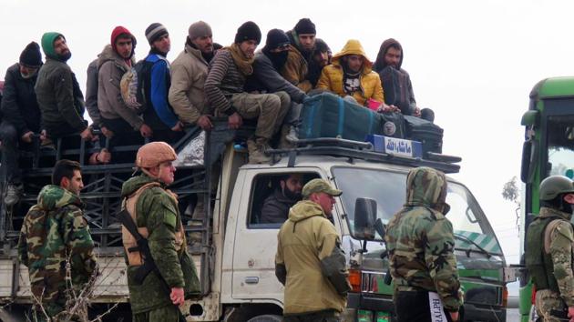 Civilians and fighters being evacuated from a rebel-held area of Aleppo. (AFP) Civilians and fighters being evacuated from a rebel-held area of Aleppo. (AFP)