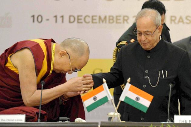 President Pranab Mukherjee with Tibetan spiritual leader the Dalai Lama during their meeting in New Delhi on Saturday.(PTI)