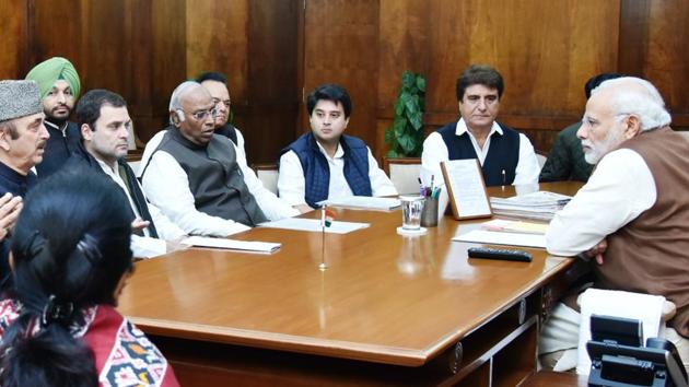 In this photograph released by India's Press Information Bureau, Prime Minister Narendra Modi meets with Congress vice-president Rahul Gandhi and party leaders in New Delhi.(AFP Photo)