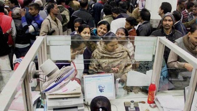 Allahabad: People standing in long queues to deposit or withdraw cash at a bank in Allahabad on Tuesday. PTI Photo (PTI12_13_2016_000075B) (PTI File Photo) Allahabad: People standing in long queues to deposit or withdraw cash at a bank in Allahabad on Tuesday. PTI Photo (PTI12_13_2016_000075B) (PTI File Photo)
