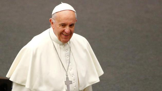 Pope Francis arrives to lead his Wednesday general audience in Paul VI hall at the Vatican on December 14. (Reuters) Pope Francis arrives to lead his Wednesday general audience in Paul VI hall at the Vatican on December 14. (Reuters)