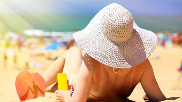 Protect your skin from the sun. Suntan may worsen your acne. It causes skin damage, wrinkles and increase the risk of skin cancer. (Shutterstock) Protect your skin from the sun. Suntan may worsen your acne. It causes skin damage, wrinkles and increase the risk of skin cancer. (Shutterstock)