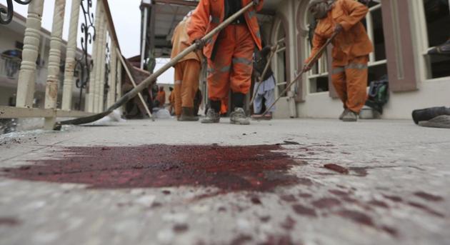 Afghan Municipality workers sweep Baqir-ul Ulom mosque after a suicide attack, in Kabul, Afghanistan on Nov 21. (AP Photo/ Representative image) Afghan Municipality workers sweep Baqir-ul Ulom mosque after a suicide attack, in Kabul, Afghanistan on Nov 21. (AP Photo/ Representative image)