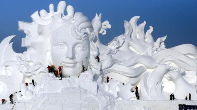 Artists work on snow sculptures at an exhibition in Harbin, Heilongjiang province, China, on December 13. (REUTERS) Artists work on snow sculptures at an exhibition in Harbin, Heilongjiang province, China, on December 13. (REUTERS)