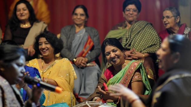 Women dance at Sangeet ceremony prior to the community marriage at Ramlila ground, in Noida on December 16, 2016.  (Sunil Ghosh  / HT PHOTO) 