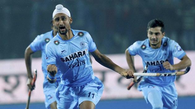 Indian players celebrate after defeating Australia in the Junior World Cup Hockey semifinal match in Lucknow on Friday. (PTI) Indian players celebrate after defeating Australia in the Junior World Cup Hockey semifinal match in Lucknow on Friday. (PTI)