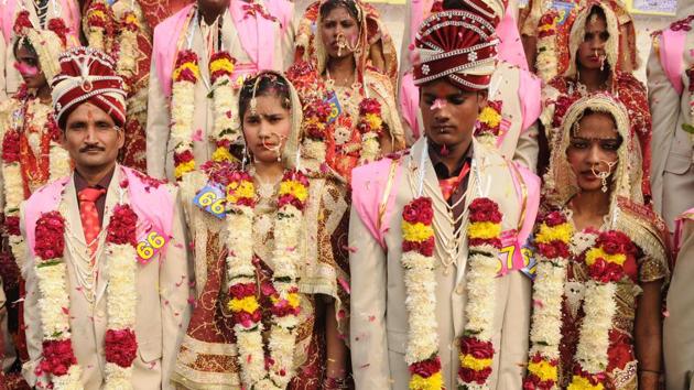 “The couples will also receive a dish set, blankets, fan, TV, gold mangal sutra, mattresses and furniture worth Rs90,000 so that they can begin their lives together easily, said an organiser.  (Burhaan Kinu/HT PHOTO) 
