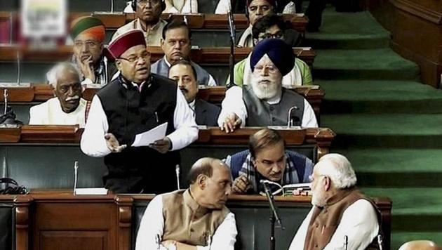 Prime Minister Narendra Modi and Parliamentary Affairs Minister Ananth Kumar talk in Lok Sabha in New Delhi on Friday. (PTI Photo) Prime Minister Narendra Modi and Parliamentary Affairs Minister Ananth Kumar talk in Lok Sabha in New Delhi on Friday. (PTI Photo)