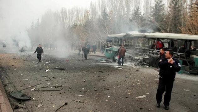 People react after a bus was hit by an explosion in Kayseri , Turkey on December 17. (Reuters) People react after a bus was hit by an explosion in Kayseri , Turkey on December 17. (Reuters)