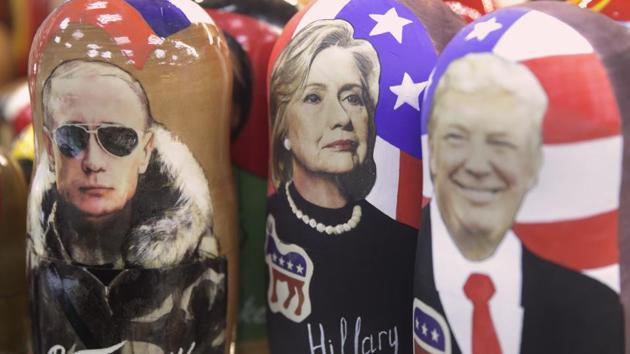 Traditional Russian wooden dolls called Matreska depicting Russian president Vladimir Putin, Hillary Clinton and Donald Trump are displayed in a shop in Moscow, Russia. (AP File Photo) Traditional Russian wooden dolls called Matreska depicting Russian president Vladimir Putin, Hillary Clinton and Donald Trump are displayed in a shop in Moscow, Russia. (AP File Photo)