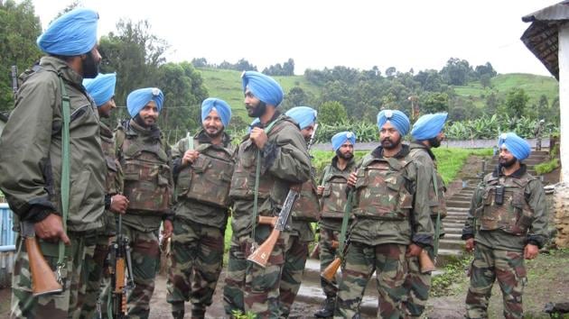 Indian peacekeepers in the Democratic Republic of Congo in 2008. In the crisis-ridden country, Lt Gen Bipin Rawat adopted an effective iron fist strategy and scripted a remarkable turnaround for the mission.(Rahul Singh/HT File Photo)