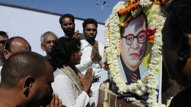 Suspended IAS officer Shashi Karnawat prays in front of BR Ambedkar’s photograph at board office crossing in Bhopal in this photo taken on December 11, 2016. (Mujeeb Faruqui/HT file photo) Suspended IAS officer Shashi Karnawat prays in front of BR Ambedkar’s photograph at board office crossing in Bhopal in this photo taken on December 11, 2016. (Mujeeb Faruqui/HT file photo)