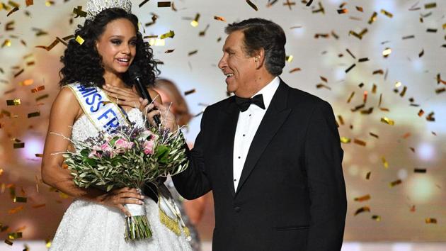 Aylies (left) with French TV host Jean-Pierre Foucault after she was crowned Miss France.  (AFP) 