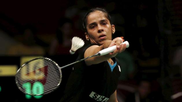 India's Saina Nehwal returns a shot to Spain's Carolina Marin during their women's finals badminton match at the BWF World Championships in Jakarta.(REUTERS)