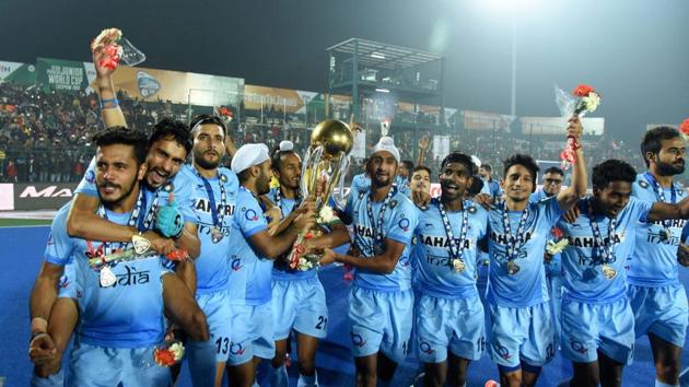 Indian Junior hockey players celebrate with the winning trophy after their victory over Belgium in the final of Junior World Cup Hockey 2016 in Lucknow.(PTI)