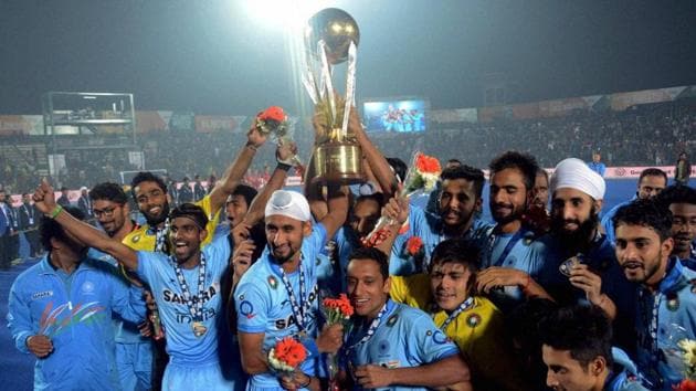 Indian Junior hockey players celebrate with the winning trophy of the Junior World Cup Hockey 2016 after their victory over Belgium.(PTI)