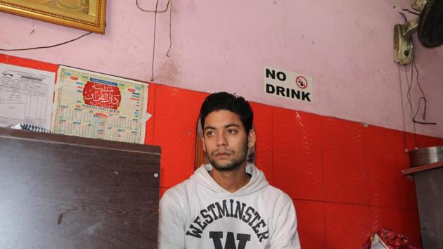 Life’s tough for the 23-year-old. Majid slogs till 2am and returns to work at 7am. He earns `7,000 a month that he sends to his family. He doesn’t have a phone and doesn’t get to watch TV. He is the son of a daily wage labourer from Haldwani, Uttarakhand. He came to Delhi five months ago looking for work. He lives in a slum in a poky little room along with other workers. (Shara Ashraf/HT Photo) 