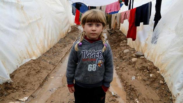 Ahmed Khairy, a 4-year-old displaced Iraqi boy at Khazer camp, Iraq. Many parents have enrolled their children in the schools run on the camp premises. (Ammar Awad / REUTERS)