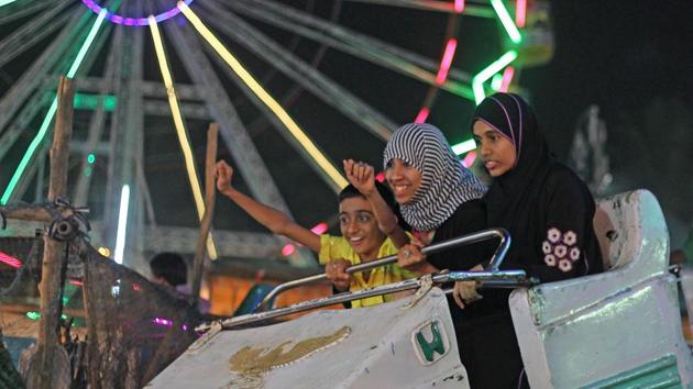 The giant wheels are a big draw, but it’s not all fun and games. The dargah stays open as late as 1 am, during the fair, to accommodate as many devotees as possible. (satyabrata tripathi/ht photo)