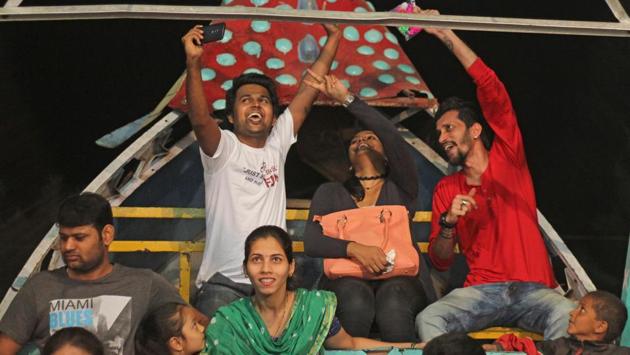 You can take part even if you’re just driving by. Stop fretting about the noise and traffic and just soak it in. (satyabrata tripathi/ht photo)