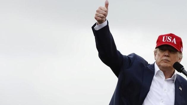 US President-elect Donald Trump gestures as he speaks during a USA Thank You Tour event in Mobile, Alabama, US. (Reuters) US President-elect Donald Trump gestures as he speaks during a USA Thank You Tour event in Mobile, Alabama, US. (Reuters)