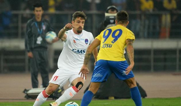 Delhi Dynamos forward Marcelinho vies for the ball with Kerala Blasters FC midfielder Josu Currais(R) in the Indian Super League. (AFP) Delhi Dynamos forward Marcelinho vies for the ball with Kerala Blasters FC midfielder Josu Currais(R) in the Indian Super League. (AFP)