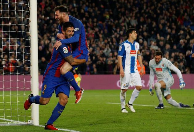 Barcelona’s Lionel Messi weaved his way through five Espanyol defenders before his shot was saved and Luis Suarez swept home. (REUTERS) Barcelona’s Lionel Messi weaved his way through five Espanyol defenders before his shot was saved and Luis Suarez swept home. (REUTERS)