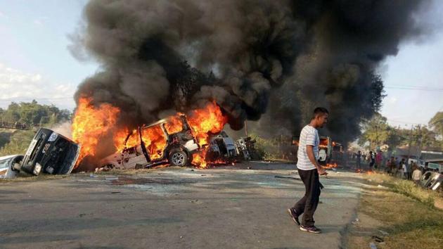Vehicles burn after protesters went on a rampage in Imphal, the capital of Manipur, on December 18, 2016. Protesters are angry with an ongoing economic blockade imposed by several Naga tribal groups in the state.(AFP Photo)