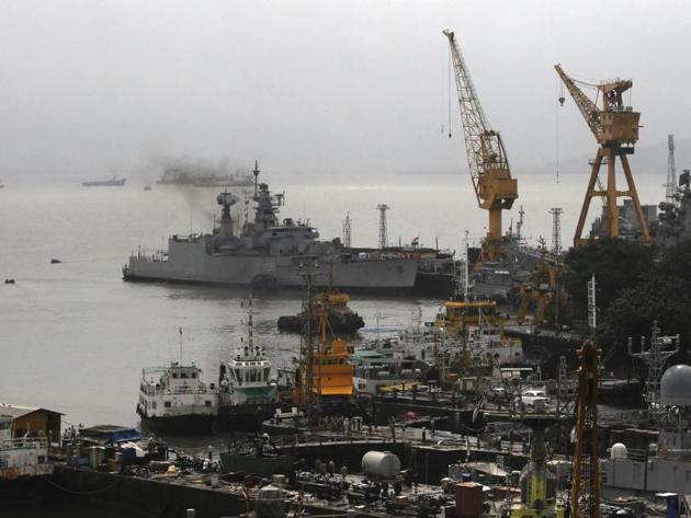 A view of the Mumbai naval dockyard. A retired naval commander has been booked for cheating a man on the pretext of a job offer at the dockyard.(AP Photo)